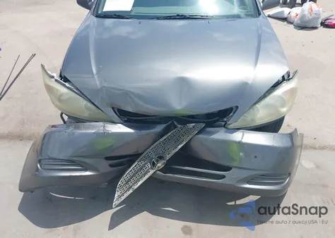 2002 Toyota Camry Le from USA, damaged, VIN JTDBE32KX20007521